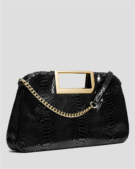 michael kors clutch black|michael kors evening clutch.